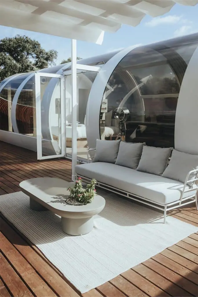 Modern glass igloo hotel for luxury glamping and unique accommodations.