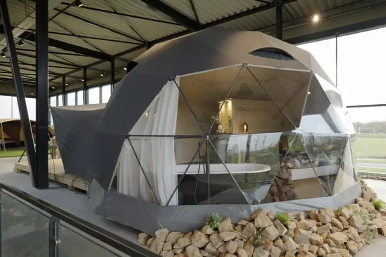 Unique geodesic tiny house with modern interior design at EJH Distribution.
