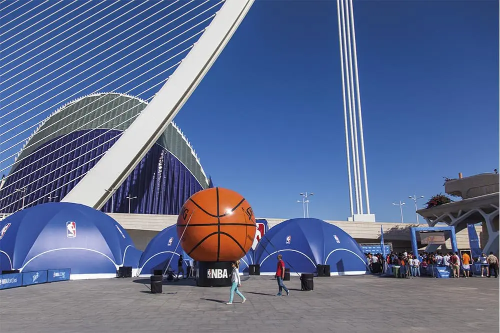 Large NBA basketball display outside futuristic convention center in Las Vegas, NV.