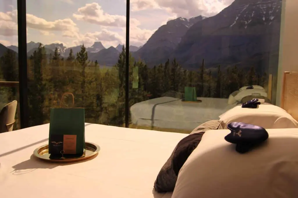 Bagel breakfast with mountainous mountain landscape view from window, scenic nature, outdoor, wilderness, travel, adventure, mountain range, forest, trees, sky, clouds, morning, morning routine, hospitality, accommodations, hotel, resort, scenic view, tourism, nature retreat, scenic landscape, outdoor activity, vacation, scenic, scenic scenery, mountain scenery, beauty of nature, adventure travel, outdoor exploration, mountain scenery, wilderness exploration, nature photography, landscape photography, travel destination, outdoor tourism, scenic mountain view, natural beauty, outdoor adventure, scenic mountain scenery, mountain tourism, serene landscape, scenic mountain landscape, peace, tranquility.
