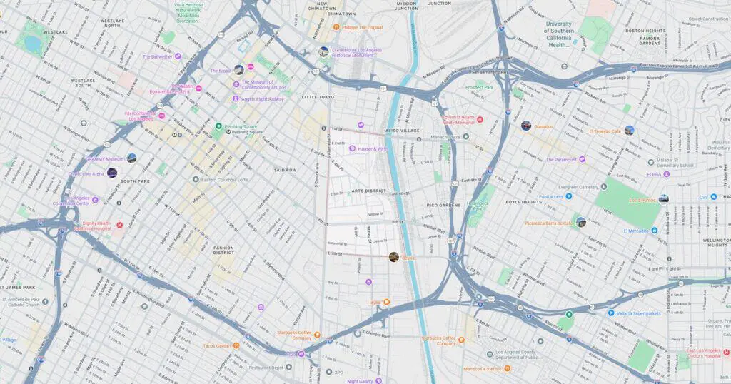 Detailed city map showing transit routes, stations, parks, and key landmarks in an urban area.