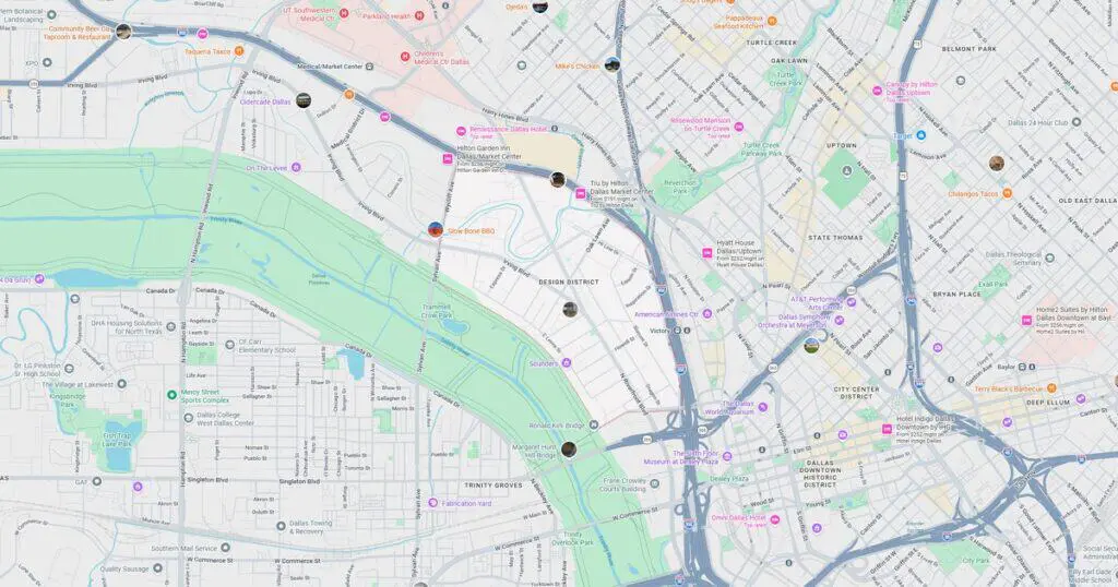 Detailed city map highlighting river, transportation lines, and key locations for navigation.