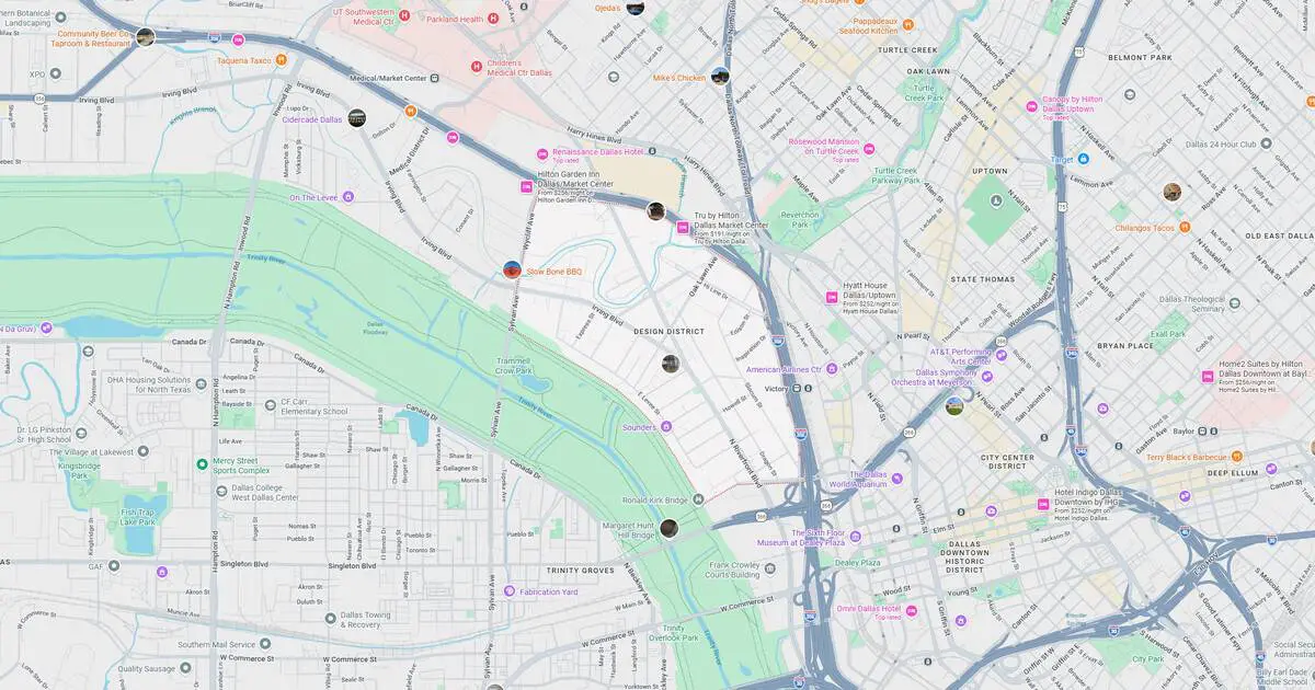 Detailed city map highlighting river, transportation lines, and key locations for navigation.
